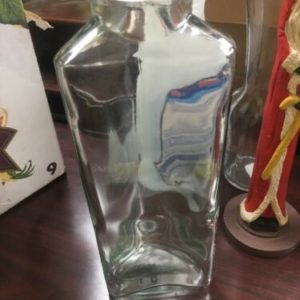 Triangle Shaped Clear Glass Bottle From Ann's House of Nuts, Without Cork